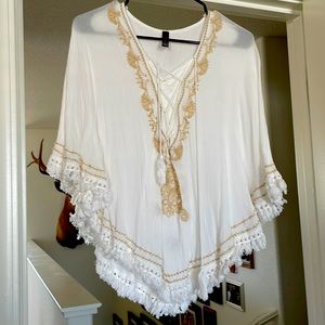 Off white embroidered caftan.